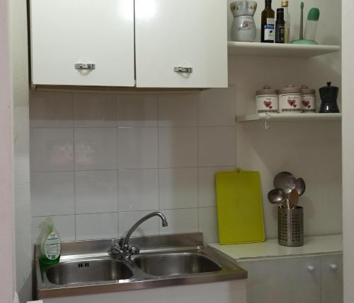 Η κουζίνα ή μικρή κουζίνα στο Casa Vista Mare nel centro di Peschici