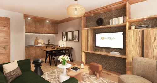 un salon avec un canapé et une table dans l'établissement Résidence Alpina Lodge, à Val dʼIsère