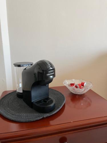 a coffee maker sitting on top of a table at Casa Lucia in Otranto