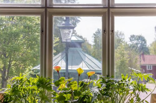 a window with a view of a street light at Villa Gransholm in Gemla