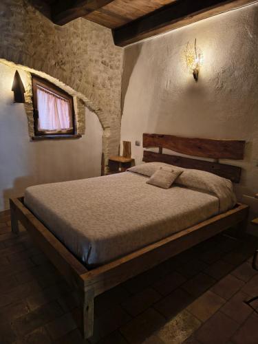 Postel nebo postele na pokoji v ubytování B&B I Martelli