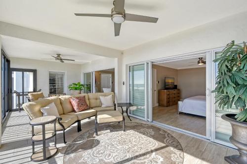 a living room with a couch and a table at Crescent Royale Condominiums 501 in Siesta Key