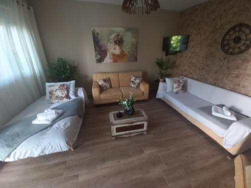 Ένα ή περισσότερα κρεβάτια σε δωμάτιο στο Vaios House