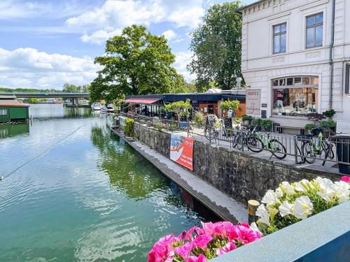 a building with bikes parked next to a river at Bungalow 2 in Quetzin