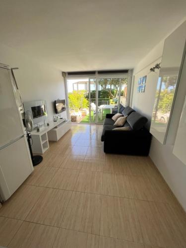 Kuchyňa alebo kuchynka v ubytovaní Platja d'Aro - Apartamento en primera línea de mar con parking