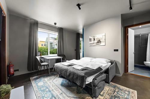 Katil atau katil-katil dalam bilik di Astro Apartments