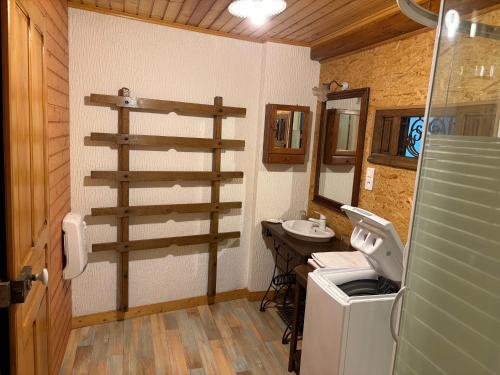a bathroom with a sink and a toilet in it at Odcvl - Le Moulin Gentrey in Harsault