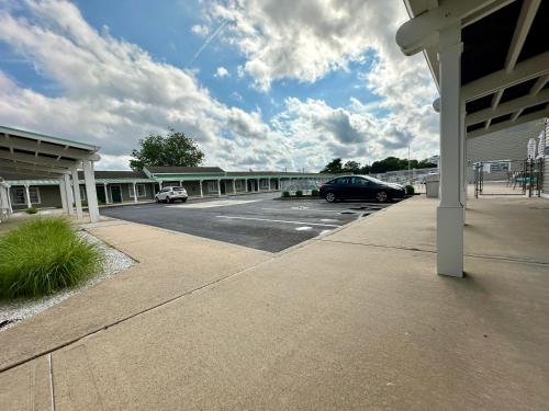 a parking lot in front of a building at Sea Girt Lodge in Sea Girt