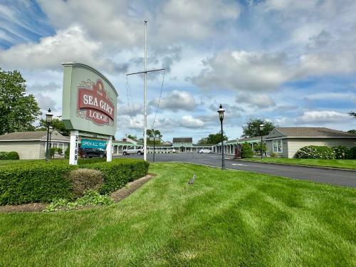 a sign for a salt lake motel on a street at Sea Girt Lodge in Sea Girt