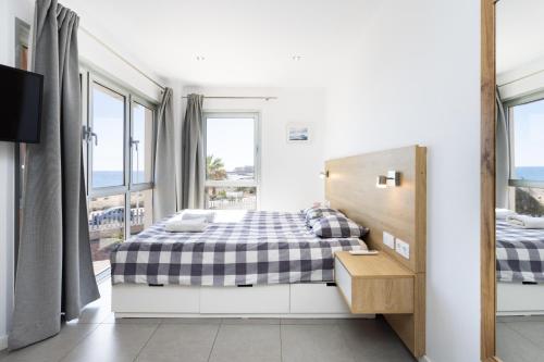 Postel nebo postele na pokoji v ubytování Panoramic sea view apartment