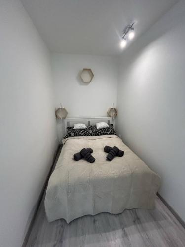 Ένα ή περισσότερα κρεβάτια σε δωμάτιο στο Horváth Apartman