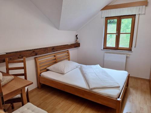 Postel nebo postele na pokoji v ubytování Privatzimmer am Weinbrunnen
