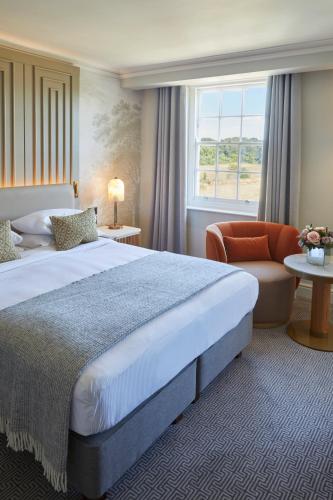 En eller flere senge i et værelse på Sopwell House Hotel