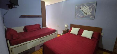 Postel nebo postele na pokoji v ubytování Yaho-hogar