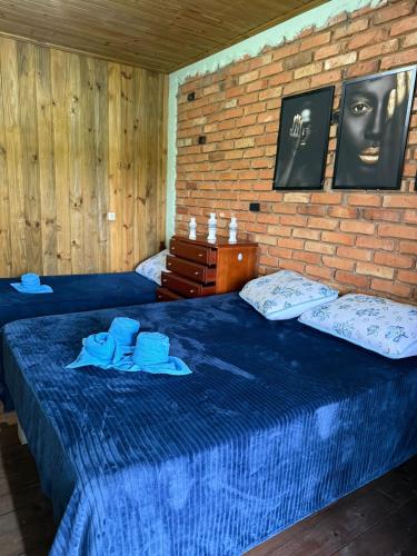 Postel nebo postele na pokoji v ubytování Pousada flor de canela