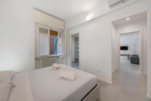 Ένα ή περισσότερα κρεβάτια σε δωμάτιο στο Appartamento Nuovissimo Ca Du Drea