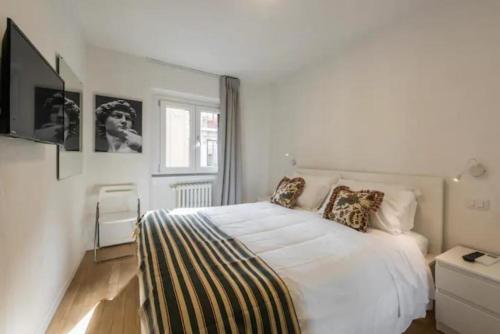 A bed or beds in a room at CDT Duomo