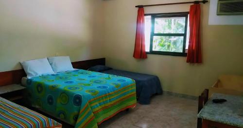 Katil atau katil-katil dalam bilik di Patipe Praia Hotel