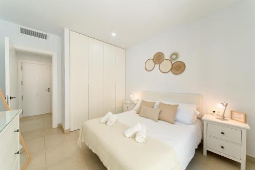 Ένα ή περισσότερα κρεβάτια σε δωμάτιο στο Elite Suite Málaga