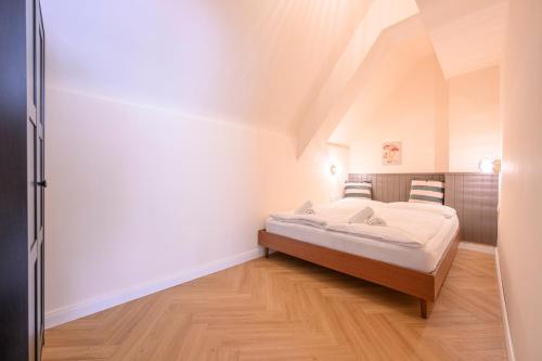 Cama o camas de una habitación en Palais Palffy Suits