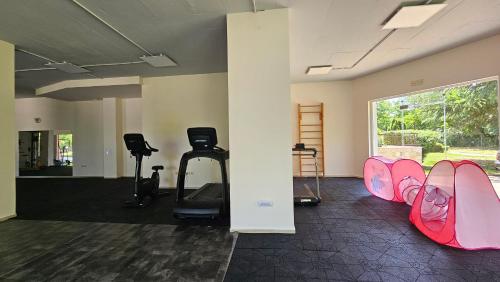 a room with a gym with some exercise equipment at Boho Breeze Aheloy in Aheloy