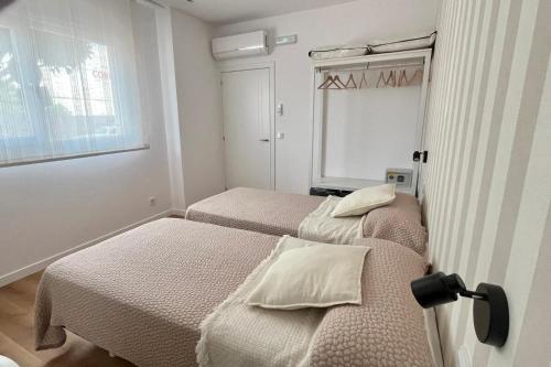 Katil atau katil-katil dalam bilik di Apartamento Xogo da Ola En el camino De Santiago