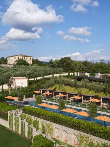 an aerial view of a resort with a pool at Collegio alla Querce, Auberge Collection in Florence