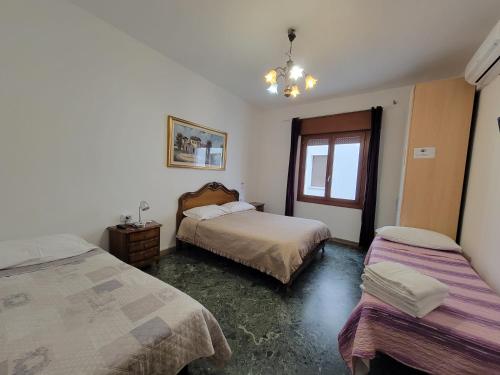 Letto o letti in una camera di The Caponi Bros
