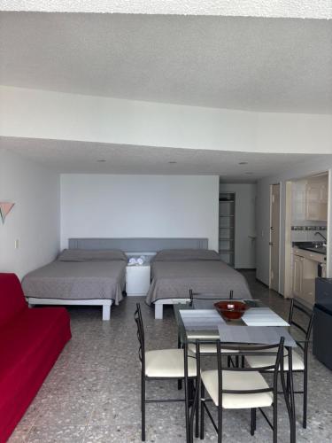 Χώρος καθιστικού στο Torres gemelas - Suite equipada con vista a la bahía