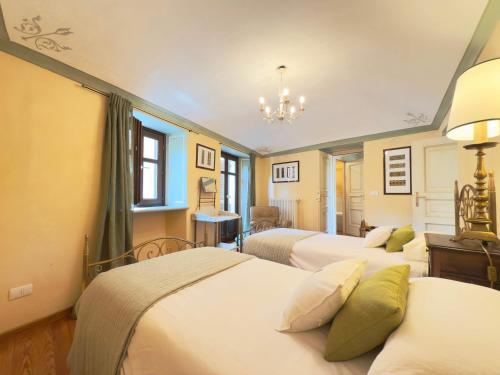 Postel nebo postele na pokoji v ubytování Homeby, Dimora il Pozzetto