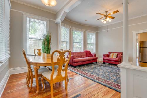a dining room with a table and chairs at Less Than 2 Mi to Dtwn Pensacola Peaceful Home with Patio in Pensacola