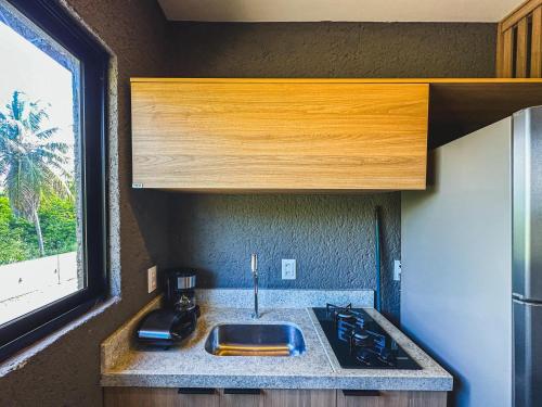 Küche/Küchenzeile in der Unterkunft Kamby Milagres - 104