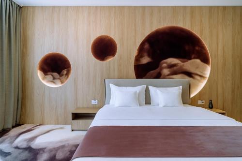 Postel nebo postele na pokoji v ubytování ARIS Boutique Hotel & SPA