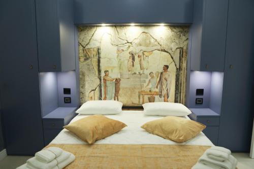 En eller flere senge i et værelse på Odeon Neapolis