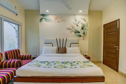 Ein Bett oder Betten in einem Zimmer der Unterkunft Ganga Moksha Homestay