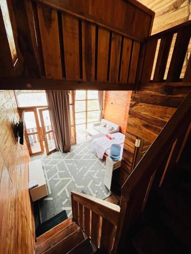Postel nebo postele na pokoji v ubytování Cabin sikunir dieng