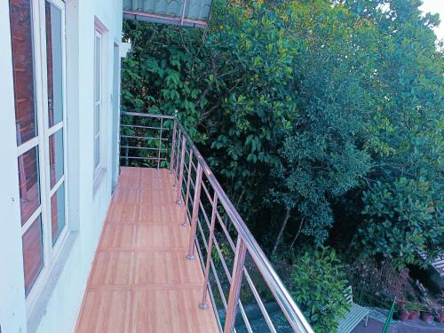Jardín al aire libre en Thekkekara Budget Rooms