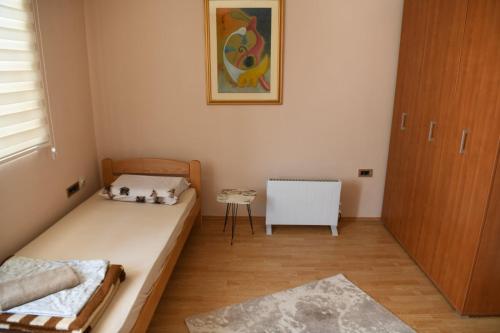 Postel nebo postele na pokoji v ubytování Stan Centar