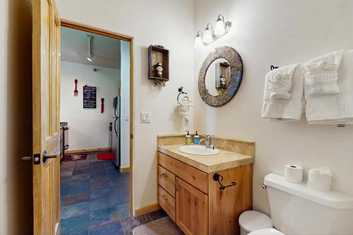 a bathroom with a sink and a toilet at Sweet Retreat in Taos Ski Valley