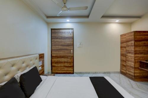 Ein Bett oder Betten in einem Zimmer der Unterkunft SPOT ON Sai P Guest House