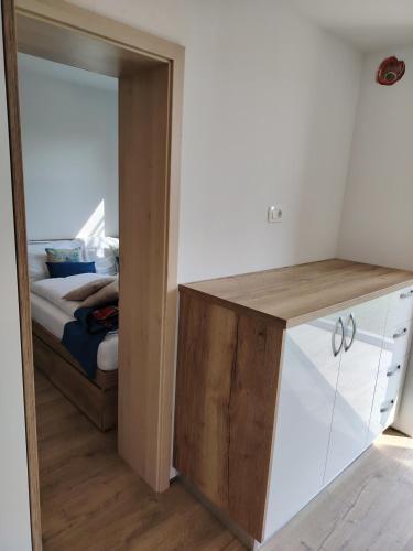 Postel nebo postele na pokoji v ubytování Apartmaji Sopotnik
