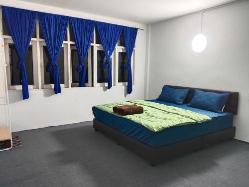 Postel nebo postele na pokoji v ubytování Banphe​ Hostel