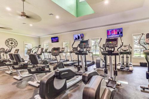 a gym with rows of treadmills and cardio machines at 2 BR Secluded patio with courtyard 5107P2 in Saint Augustine