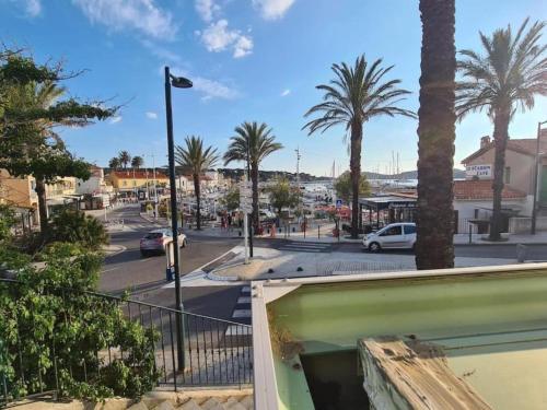a view of a city street with palm trees at Villa in Ampus with Panoramic Views & Pool in Ampus