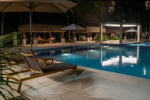 Bazén v ubytování Custom decor-sleeps 6 with 2 pools- Condo near beach-Puerto Morelos Mexico,Casa Yellowstone nebo v jeho okolí