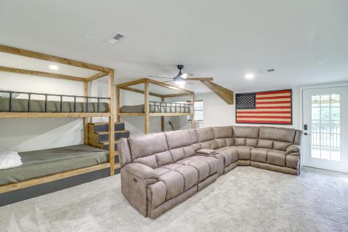 a living room with a couch and bunk beds at 2 Mi to Buffalo River Peaceful Family Retreat 