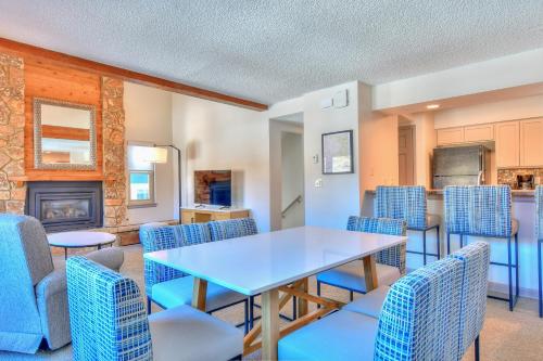 a dining room with a table and chairs at Wedgewood Lodge in Breckenridge