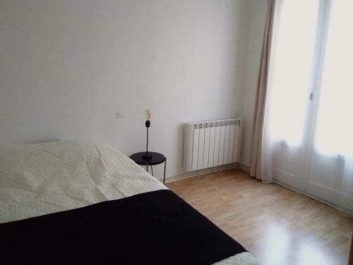Katil atau katil-katil dalam bilik di Appartement moderne à Rodez de 46 m² avec balcon