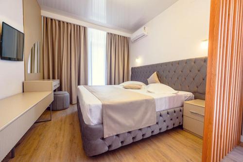 Katil atau katil-katil dalam bilik di Office Villas Costinesti