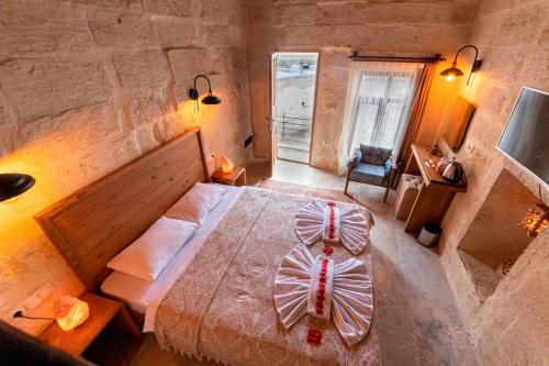 Katil atau katil-katil dalam bilik di feris cave hotel